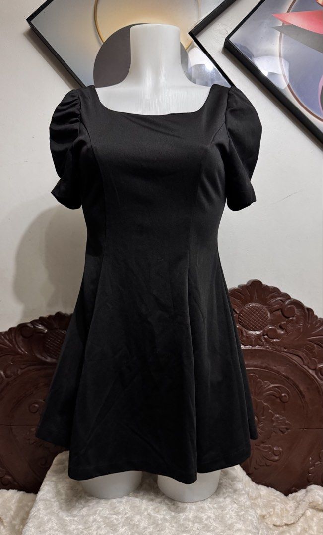 Classy Black Puff Sleeve Square Neck Mini Dress (Category: Dresses) located in Marikina City. Submitted by lorradel (Listing ID 1446253897, Image 1). Description: - length from shoulder 30in - Black mini dress - Puff sleeves - Square neckline - Flared skirt - Back zipper closure - Ideal for parties or a night out - Simple and chic design (magbase po sa size ng mannequin if it will fit you pati sa haba as you can see sa pic) - MAY HAVE some washab