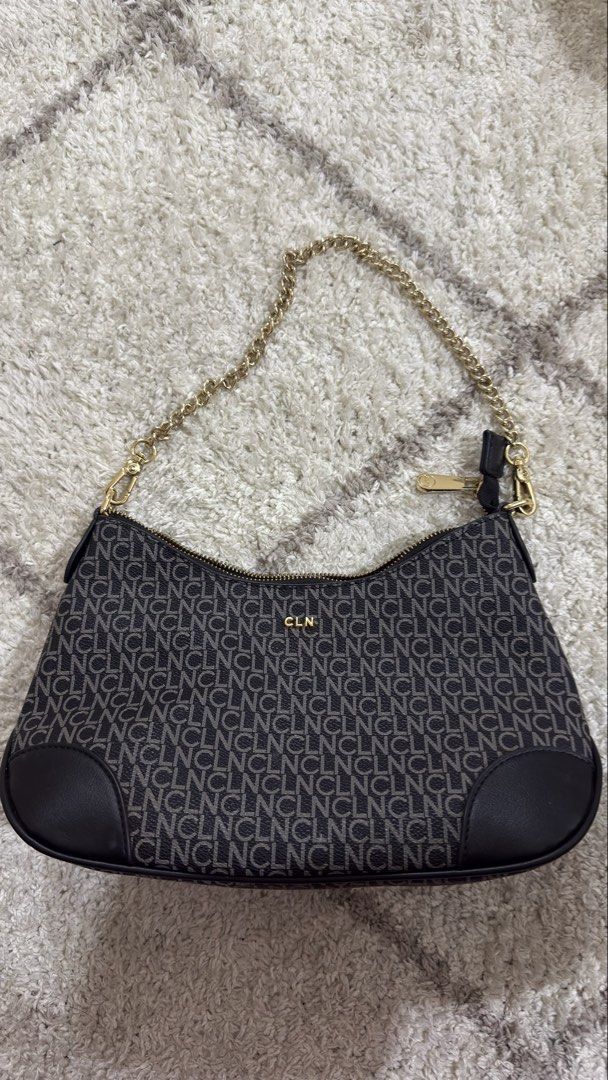 CLN Monogram Shoulder Bag with Gold Chain (Category: Luxury Bags & Wallets) located in Makati City. Submitted by jimmysellsph (Listing ID 1446276496, Image 1). Description: - Cute CLN shoulder bag - All-over monogram print - Gold chain strap - Patterned interior lining - Zipper closure - Ideal for everyday use or nights out.