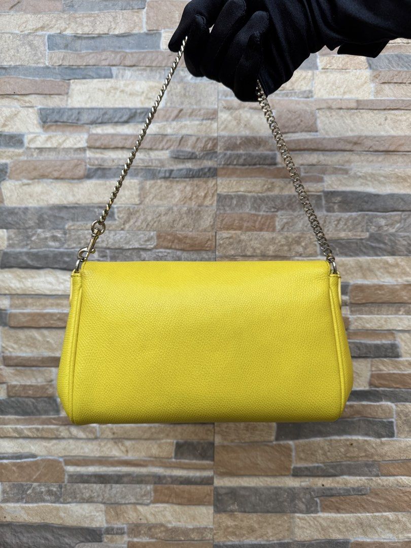 Coach Mini Ruby (Category: Luxury Bags & Wallets) located in Cavite. Submitted by justbrowsing_decluttering (Listing ID 1446221113, Image 3). Description: Cross-body | Shoulder Bag 1 pocket inside Color: Yellow/Mustard with Gold Tone Hardware Size: Small Material: Genuine Leather [Colors may vary due to lighting. Bags are Preowned so it will Not be Perfect; Unless stated new.] Stratches on Hardware Guaranteed Authentic💯 Condition: 7/10 Rank: B .