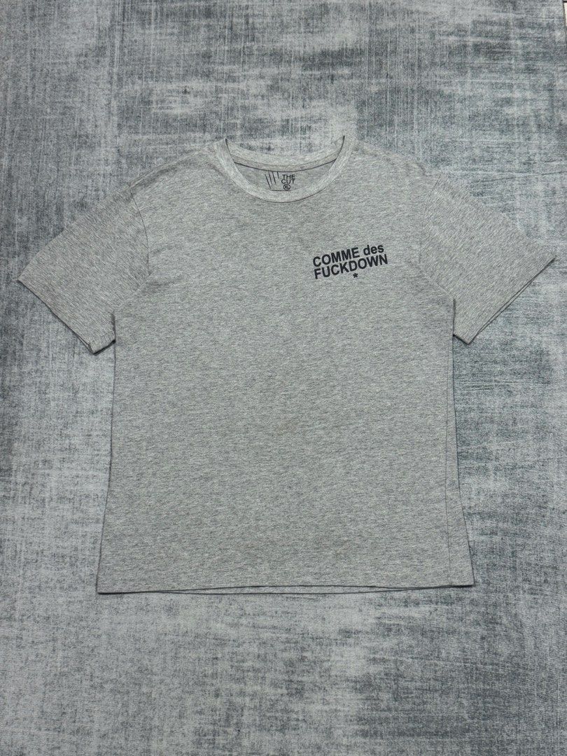 Comme des FUCKDOWN * - Vintage Shirt (Category: Tshirts & Polo Shirts ) located in Manila. Submitted by members-only (Listing ID 1446285096, Image 1). Description: Comme des FUCKDOWN Shirt Size: XL fit Medium only Dimes: 20 x 27 Very good condition No issue Fade washcare vintage type.