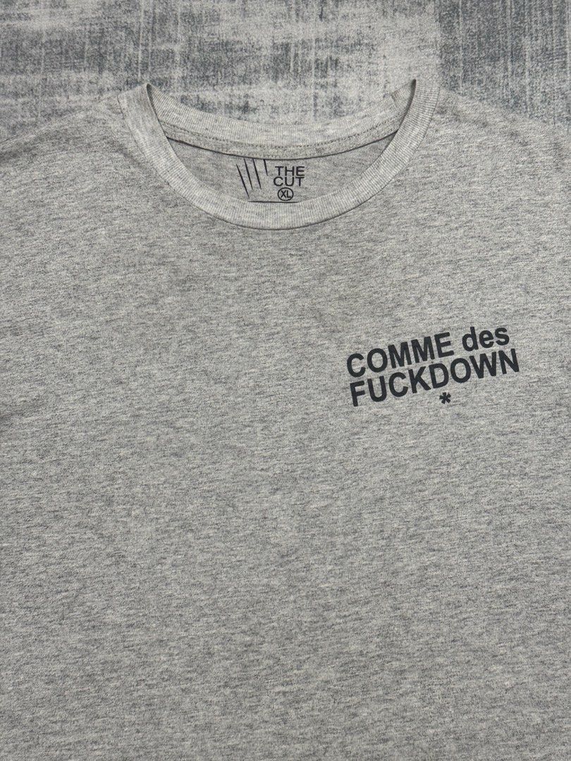 Comme des FUCKDOWN * - Vintage Shirt (Category: Tshirts & Polo Shirts ) located in Manila. Submitted by members-only (Listing ID 1446285096, Image 2). Description: Comme des FUCKDOWN Shirt Size: XL fit Medium only Dimes: 20 x 27 Very good condition No issue Fade washcare vintage type.