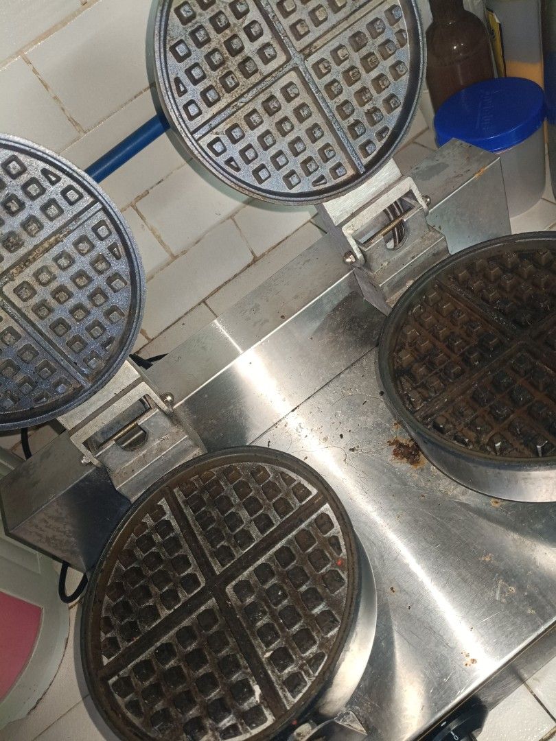 As Is Commercial Waffle Maker - Multiple Units Available (Category: Other Kitchen Appliances) located in Manila. Submitted by romarateam48261 (Listing ID 1446190287, Image 1). Description: - Commercial waffle maker ideal for cafes and restaurants. - Includes multiple interchangeable waffle plates. - A great addition to any busy kitchen. - Feel free to ask any questions!.