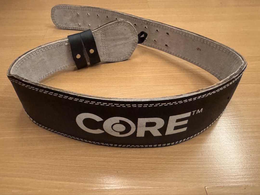 CORE Weightlifting Belt XL Black Leather (Category: Toning & Stretching Accessories) located in Taguig. Submitted by crossmill23 (Listing ID 1446327646, Image 2). Description: - CORE weightlifting belt - Color: Black leather with white stitching - Size: XL - Provides good support for lifting - Shows some signs of use but is fully functional - Perfect for your next workout session - RFS: Not used anymore.