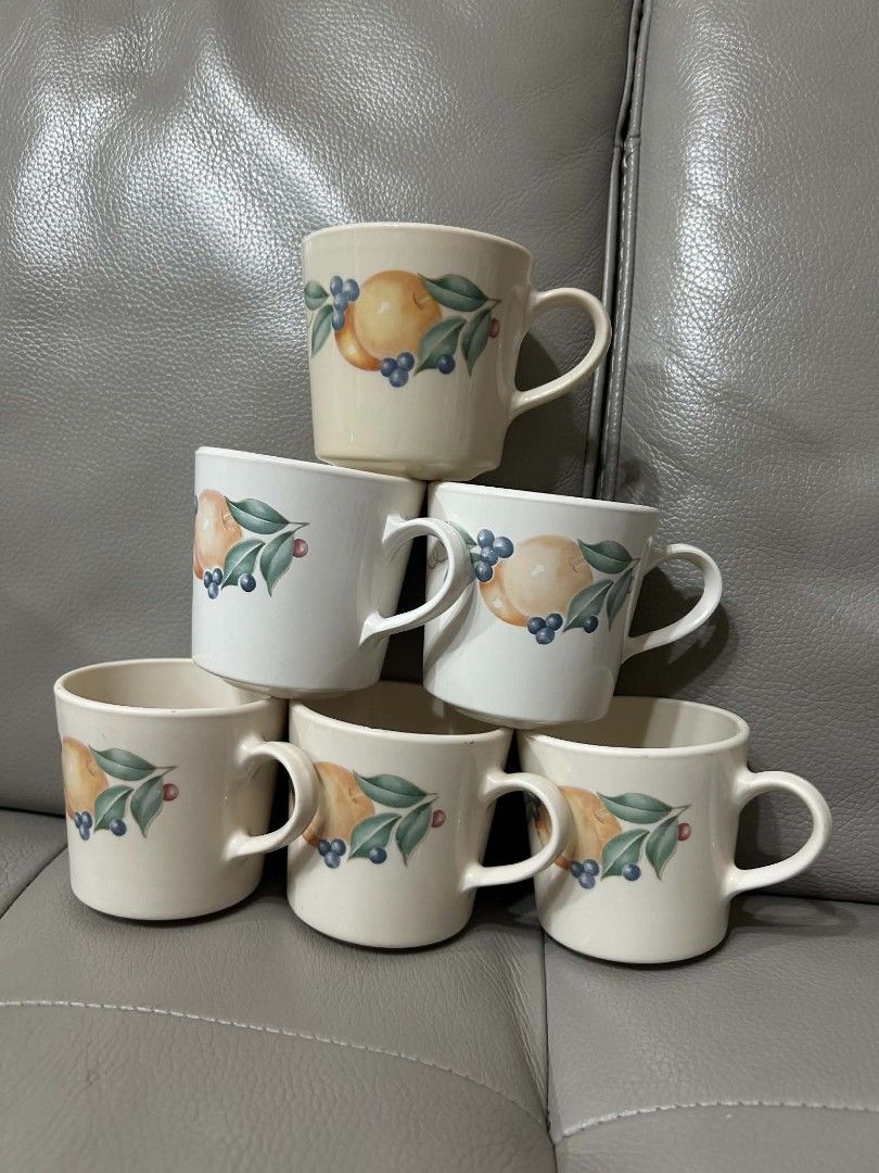 CORNING Mugs - Various Designs (Category: Coffee & Tea Tableware) located in Cebu City. Submitted by mjuntilla (Listing ID 1446277396, Image 3). Description: - 250 pesos each Microwave safe No chip/cracks - Assorted designs: floral (blue & orange), fruit, and stripes - Some mugs feature a textured swirl design - Ideal for coffee, tea, or any beverage - Great for gifting or updating your kitchenware.