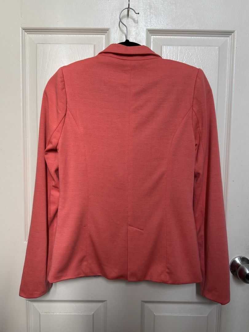 Cotton On Coral Pink Blazer (Category: Coats, Jackets and Outerwear) located in Cavite. Submitted by mjpv22 (Listing ID 1446332466, Image 2). Description: - Coral pink blazer from Cotton On - Padded shoulders - Single button closure - Two flap pockets on the front - Fully lined interior - Other clothing items are available on my profile. Feel free to check them out! :) .