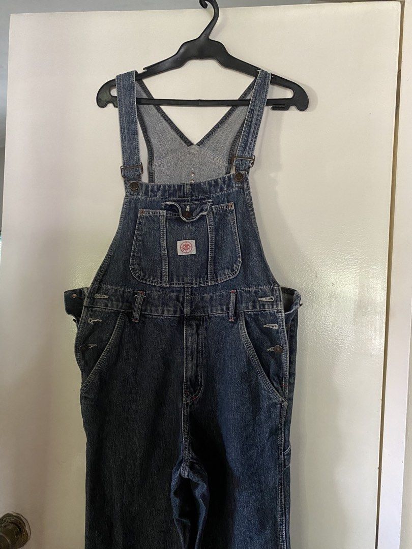 Denim Bib Overalls (Category: Coats, Jackets and Outerwear) located in Paranaque City. Submitted by helloooooopoo (Listing ID 1446221694, Image 2). Description: - Classic blue denim bib overalls - Features multiple pockets on the bib and sides. - Adjustable straps for a comfortable and secure fit. - Made with durable material, ideal for work or casual wear. - A versatile staple piece for any wardrobe. Dm for questions.