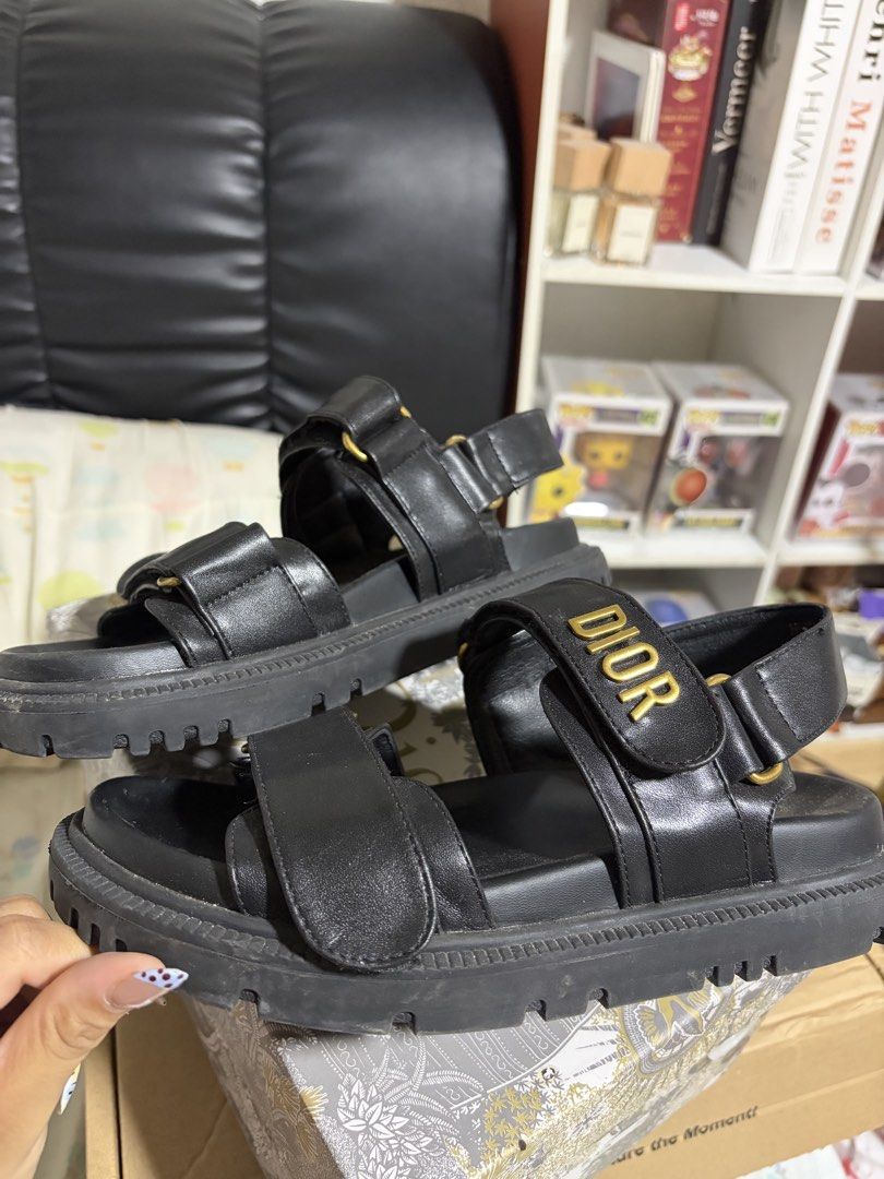 Dior Black Leather Strap Sandals (Category: Flats & Sandals) located in Mabalacat. Submitted by leyxzz_declutter (Listing ID 1446330459, Image 2). Description: - Black Leather Dior Sandals - Size 6 can fit up to 7 - you can see the issue on the last photo posted below - needs cleaning - NOT AUTHENTIC BUT HIGH QUALITY PAIR RFS: Decluttering Slightly Negotiable .