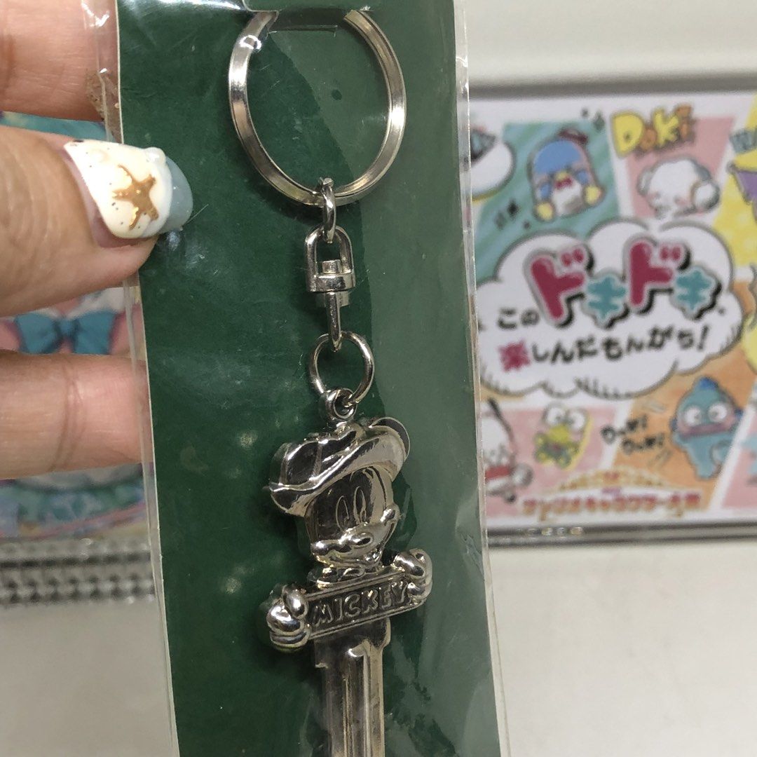 DISNEY MICKEY MOUSE METAL KEYCHAIN (Category: Character Goods) located in Quezon City. Submitted by kitsune.treasures (Listing ID 1446298500, Image 3). Description: *First to pay policy! *1 day reservation only. Failure to pay on time, auto cancel. 📍Quezon City * MOD: J&T | Lalamove * MOP: GCASH | BPI 📦ON HAND AND READY TO SHIP CONDITION: WHAT YOU SEE IS WHAT YOU GET. Dimensions: Kindly check the photos for the actual measurements. Please check