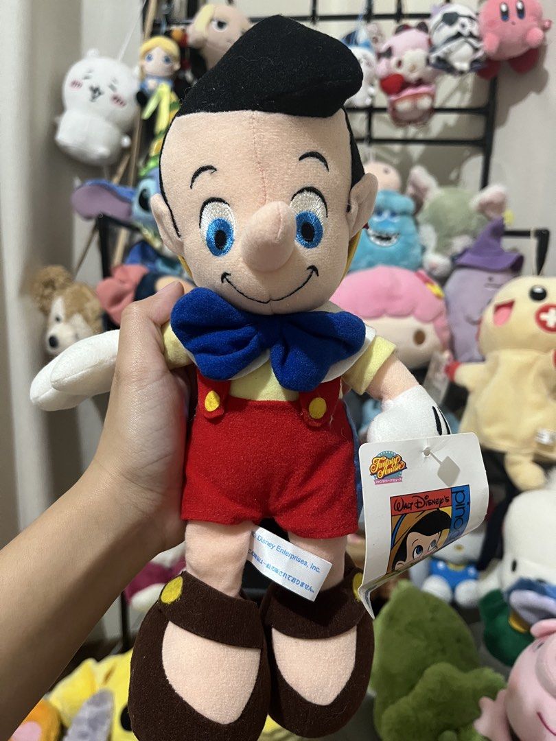 Disney Pinocchio Plush Toy with Tag (Category: Plushies & Soft Toys) located in Taytay. Submitted by blitzncharms (Listing ID 1446313268, Image 2). Description: Cute Pinocchio plush toy. Classic Disney character design. Comes with original tags attached. Great for collectors or fans of Disney. Soft and huggable. Ready for a new home..