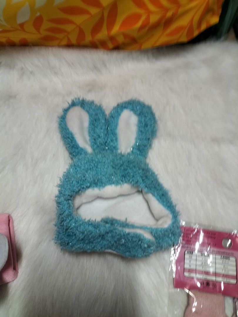 Dog Clothes, Bunny Hat, and Pet Socks Bundle (Category: Homes & Other Pet Accessories) located in Taytay. Submitted by tina.bel.s (Listing ID 1446188651, Image 3). Description: Pet Items for Sale Pink hoodie Bundle - 300php -Includes Pink hoodie(XS size), Rabbit head wear and 2 pc socks Chucky Costume for dogs- 180 php - Costume and wig Cute Pet Leash( brand new) - 90php each Pet leash adjustable color Red- 150 php Pet Carrier Cream and orange ch