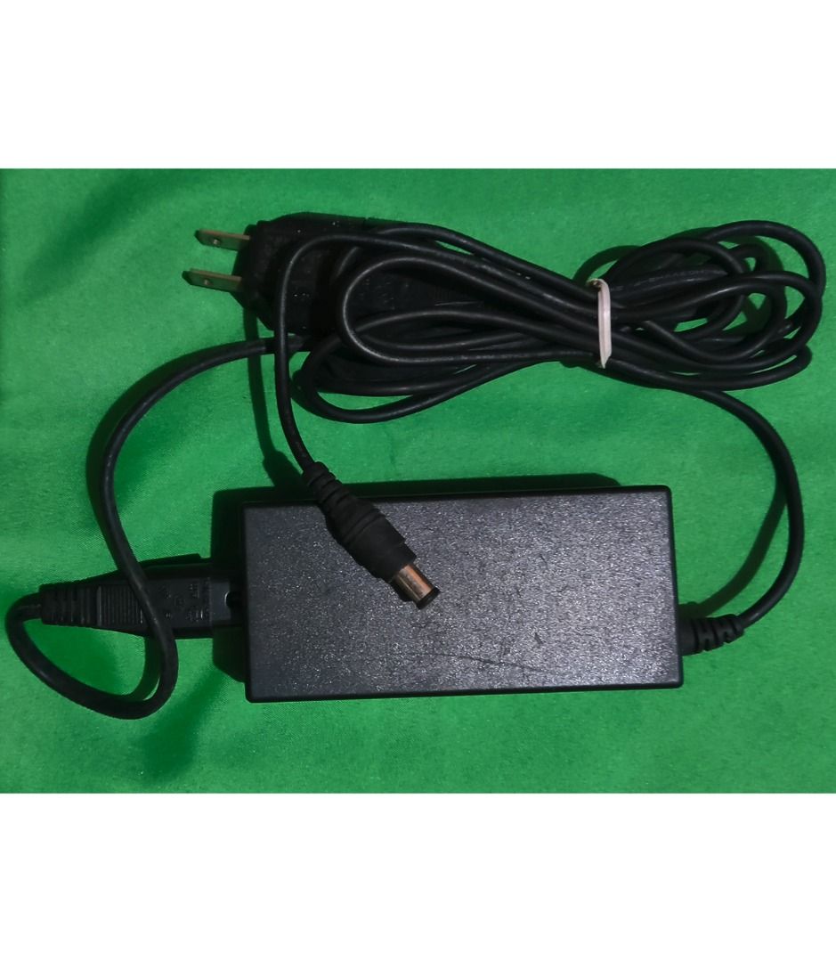 Epson AC Adapter Model A411E 24V 1.3A (Category: Printers, Scanners & Copiers) located in Binan City. Submitted by enrivo (Listing ID 1446325630, Image 2). Description: - Epson AC Adapter - Model: A411E (Rev: 01) - Input: 220-240V~50-60Hz 0.5A 40W - Output: 24V 1.3A (40W) - Primarily used for Epson Photo Scanners (such as the V500, V600, V700, and GT-1500) - Connector: 6.5 x 4mm center pin barrel - Condition: Works well, tested..