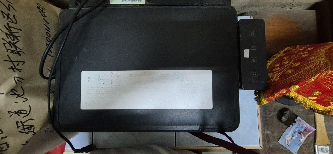 Epson L210 Printer (Category: Printers, Scanners & Copiers) located in Manila. Submitted by book_works (Listing ID 1446215030, Image 3). Description: - Epson L210 Printer - Color: Black - Power cord and usb cord needs replacement - difficult to turn on (damaged power button, possible broken and needs to be repaired) - prints only black and white (problem with printer head) - scanner tray lid hinge broken (easily detaches) RFS: decluttering last u