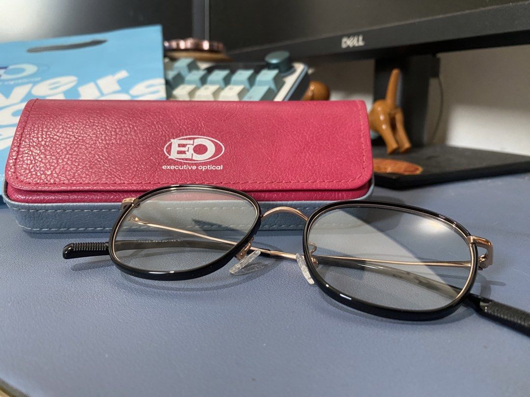 Eyeglasses with Case (Category: Sunglasses & Eyewear) located in Antipolo. Submitted by aes_collection (Listing ID 1446246819, Image 3). Description: Original Price: ₱1,299 Bought at EO SM Masinag Branch RFS: Not my style anymore (used only for a month) ‼️HAS NO ISSUE, DENTS, AND SCRATCHES‼️ - Black and gold framed eyeglasses - Has no grade - Brand: Executive Optical - Includes pink leatherette case - Sold as a set.