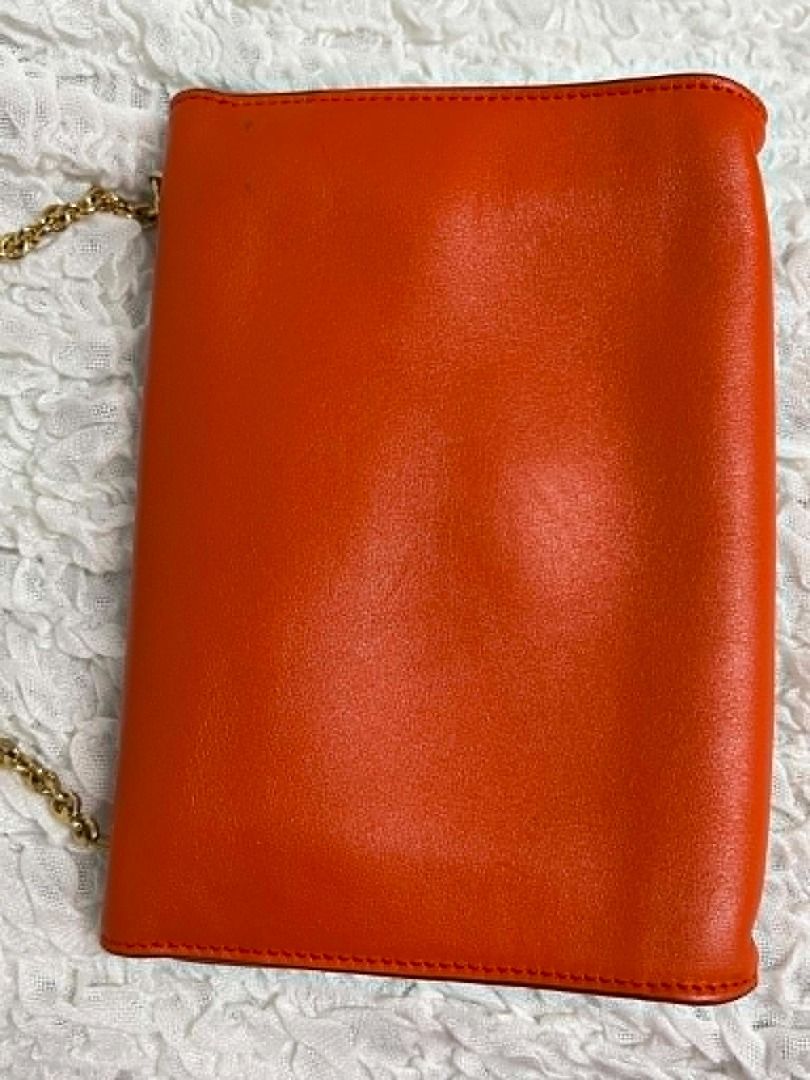 Ferragamo Sling Bag (Category: Luxury Bags & Wallets) located in Quezon City. Submitted by njood (Listing ID 1446254854, Image 3). Description: Ferragamo Sling bag Golden chain sling In excellent condition With very slight signs of usage.