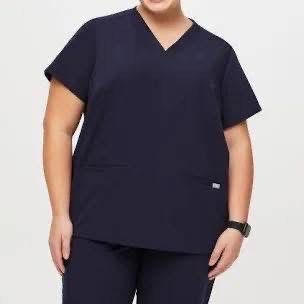 FIGS Navy Blue Scrub Top XXL 3 Pockets (Category: Tshirts & Polo Shirts ) located in Cagayan de Oro. Submitted by lynnecollection (Listing ID 1446163400, Image 3). Description: - Brand: FIGS - Color: Navy Blue - Size: XXL - Pockets: 3 - Measurements: Bust 48", Sleeve 17", Length 29" - Features: Comfortable and practical for work.