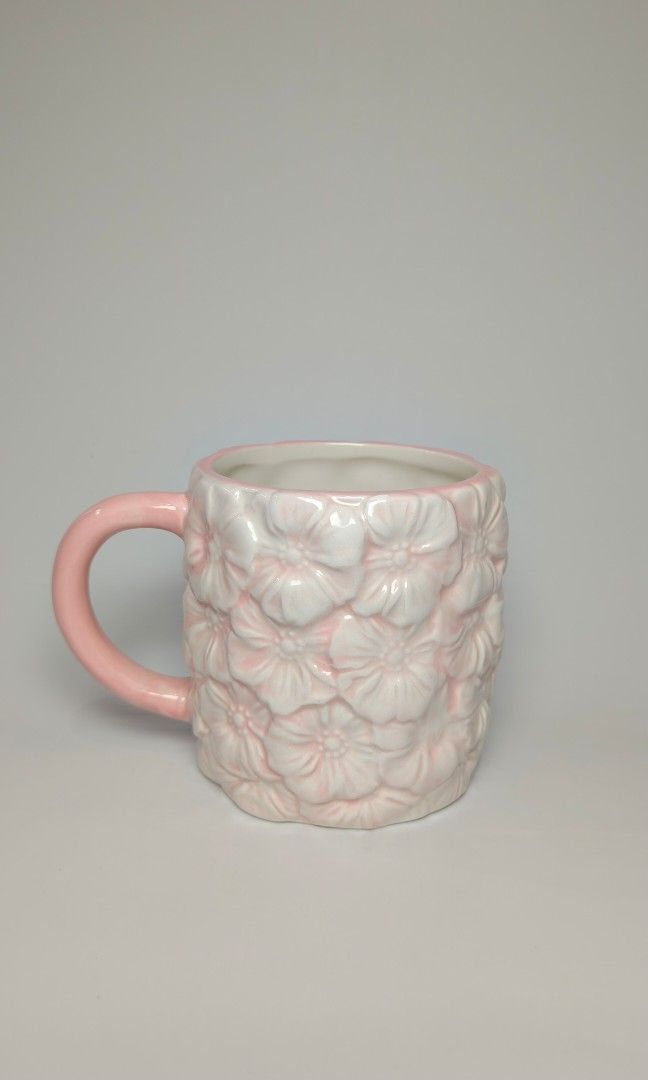 Flower embossed mug (Category: Coffee & Tea Tableware) located in Cavite. Submitted by phtmt (Listing ID 1446293757, Image 1). Description: .