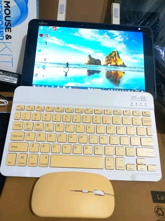 💜Fujitsu Q5010: 2n1 TABLET➖LAPTOP💜 (Category: Windows) located in Manila. Submitted by lonelyme_1986 (Listing ID 1446319161, Image 2). Description: 💜Fujitsu Q5010: 2n1 TABLET➖LAPTOP💜 ✅Touchscreen:with wireless KB➖mouse✅ 🛑intel Celeron 1.90GHz 🛑Ram:4GB 🛑Storage:128GB ssd 🛑Intel hd graphics 🛑10.1 inches Screen 🛑Good battery 🛑Wifi ready 🛑Camera ready 🔴Bluetooth ready ✅Windows 10-with complete all apps #GoodQualityGuaranteed fresh from j