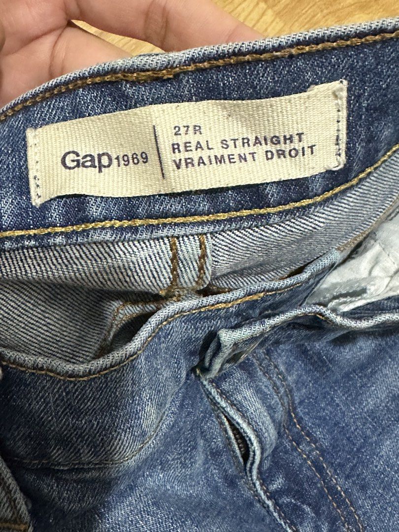 Gap 1969 Real Straight Jeans 27R (Category: Jeans) located in Antipolo. Submitted by soshops (Listing ID 1446327902, Image 3). Description: - Brand: Gap 1969 - Style: Real Straight Fit Jeans - Size: 27R - Color: Blue Denim - Features: Distressed details on front and back pockets - Leg Style: Classic Straight Leg - Occasion: Great for everyday wear.