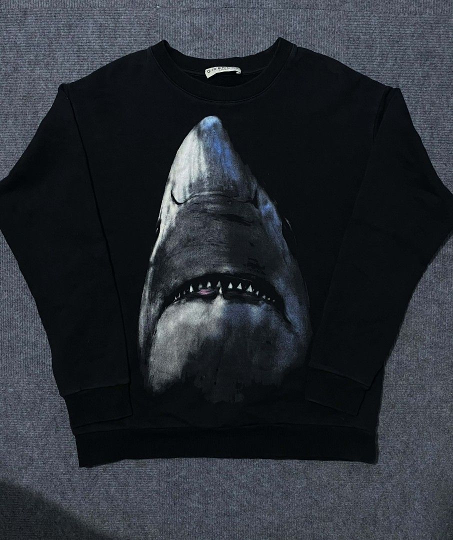 Givenchy Paris Black Shark Print Sweatshirt (Category: Coats, Jackets and Outerwear) located in Caloocan City. Submitted by nashper (Listing ID 1446344834, Image 2). Description: - Black Givenchy sweatshirt - Iconic shark print - Crew neck, long sleeves - Made in Portugal - Size 50 - Statement piece.