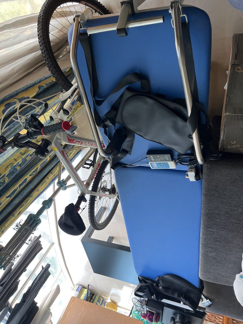 Inversion Bed with Digital Controller (Category: Cardio & Fitness Machines) located in Singapore. Submitted by e_shin161 (Listing ID 1446210287, Image 2). Description: - Blue inversion bed - Digital controller - Ankle restraints - Padded back support - Ideal for back pain relief and stretching - Folds for easy storage - Simple assembly - Lightly used (a few times).