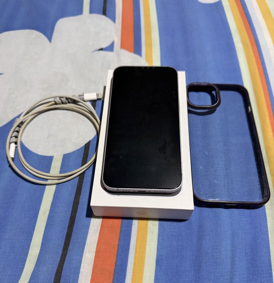 iPhone 14, 128GB, Open line, Purple (Category: iPhone 14 Series) located in Quezon City. Submitted by la_senorita.bcn (Listing ID 1446343876, Image 2). Description: Purple iPhone 14 128 GB, open line, battery health = 82%, never repaired Inclusions: Cable, box, matte screen protector, 1 case MOP: Gcash/Maya/BPI.