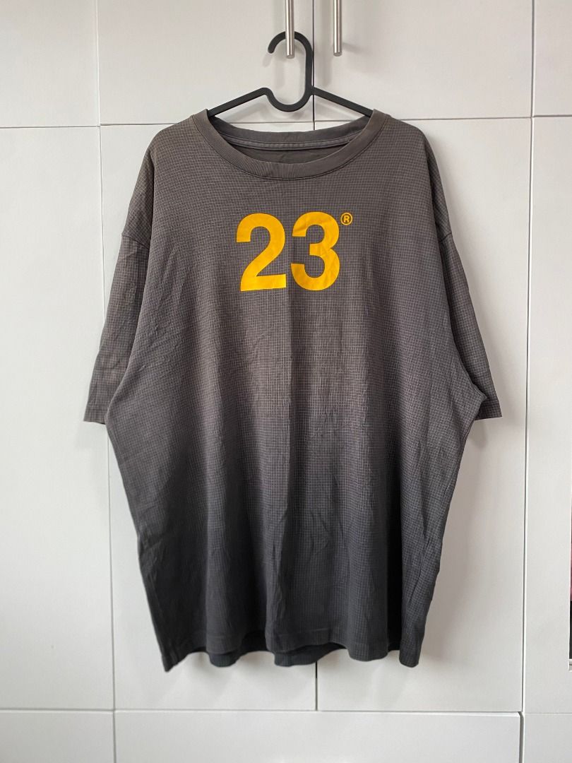 Jordan Engineered For Flight 23 T-Shirt (Category: Tshirts & Polo Shirts ) located in Tagaytay City. Submitted by grayl_thrift (Listing ID 1446314093, Image 1). Description: - Grey Jordan t-shirt - Yellow '23' graphic on front - Jordan logo and 'ENGINEERED FOR FLIGHT SP22' on back - Textured fabric - Loose fit.