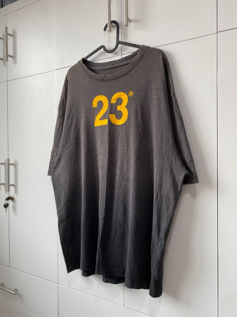 Jordan Engineered For Flight 23 T-Shirt (Category: Tshirts & Polo Shirts ) located in Tagaytay City. Submitted by grayl_thrift (Listing ID 1446314093, Image 2). Description: - Grey Jordan t-shirt - Yellow '23' graphic on front - Jordan logo and 'ENGINEERED FOR FLIGHT SP22' on back - Textured fabric - Loose fit.