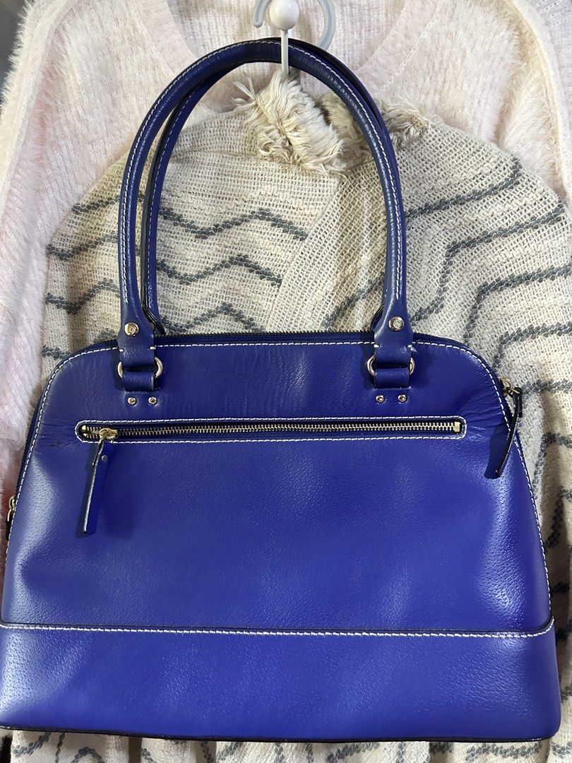 Kate Spade Blue Leather Satchel Handbag Large (Category: Luxury Bags & Wallets) located in Manila. Submitted by minani (Listing ID 1446246676, Image 2). Description: - Brand: Kate Spade - Color: Blue - Material: Leather - Style: Satchel - Closure: Zip - Features: Top handles, polka dot interior lining - Condition: Minor exterior marks, faint interior stains. Plenty of life left..