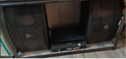 K-AUDIO (2 SPEAKER AND AMPLIFIER) (Category: Soundbars, Speakers & Amplifiers) located in Caloocan City. Submitted by roxsell.00 (Listing ID 1446219206, Image 1). Description: - Complete PA system including 2 speakers and 1 amplifier. - Ideal for events, parties, or home entertainment. - Speakers feature a stylish mesh front with a logo. - Amplifier has multiple control buttons and a prominent volume knob. - All components are sleek black. - Read