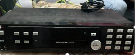 KINGSONIC (50218BT7537) (Category: Portable Music Players) located in Caloocan City. Submitted by roxsell.00 (Listing ID 1446215660, Image 1). Description: - Black DVD Karaoke Player - Full number pad for easy song selection - Controls for vocal, echo, and mic volume - Clear and record buttons included - Comes with power cord - Ready for your next karaoke party!.
