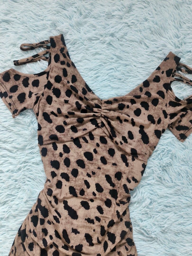 Leopard Print Cold Shoulder Ruched Bodycon Mini Dress (Category: Dresses) located in Quezon City. Submitted by alluring.avenue (Listing ID 1446272034, Image 2). Description: Cute leopard print mini dress. Features a ruched front detail and cold shoulder cut-outs with tie straps. Stretchy material. Great for a night out or a party. Fits snugly..