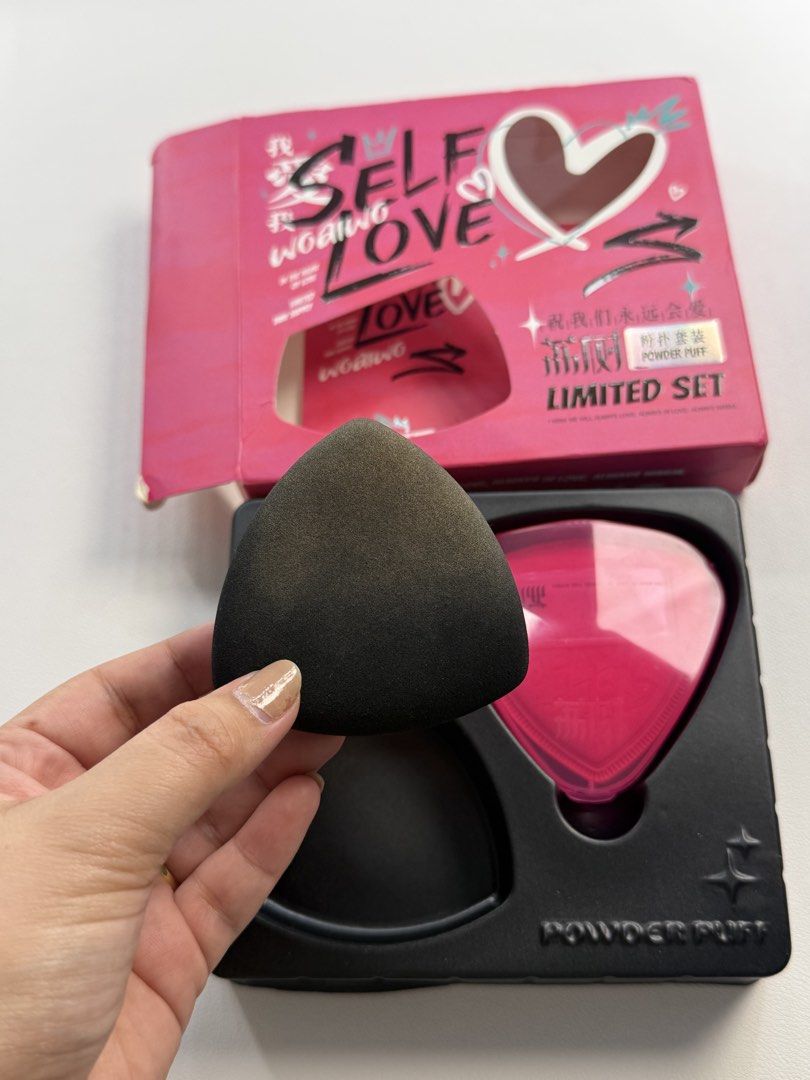 Lishu Self Love Limited Edition Sponge Puff Set (Category: Makeup) located in Cavite. Submitted by darkhedastripes27 (Listing ID 1446279932, Image 2). Description: - Lishu Self Love Limited Edition Powder Puff Set - Includes 2 triangular powder puff and 1 holder - Adorable pink packaging with 'Self Love' graphics - Ideal for flawless makeup application - A cute and essential addition to your makeup collection.