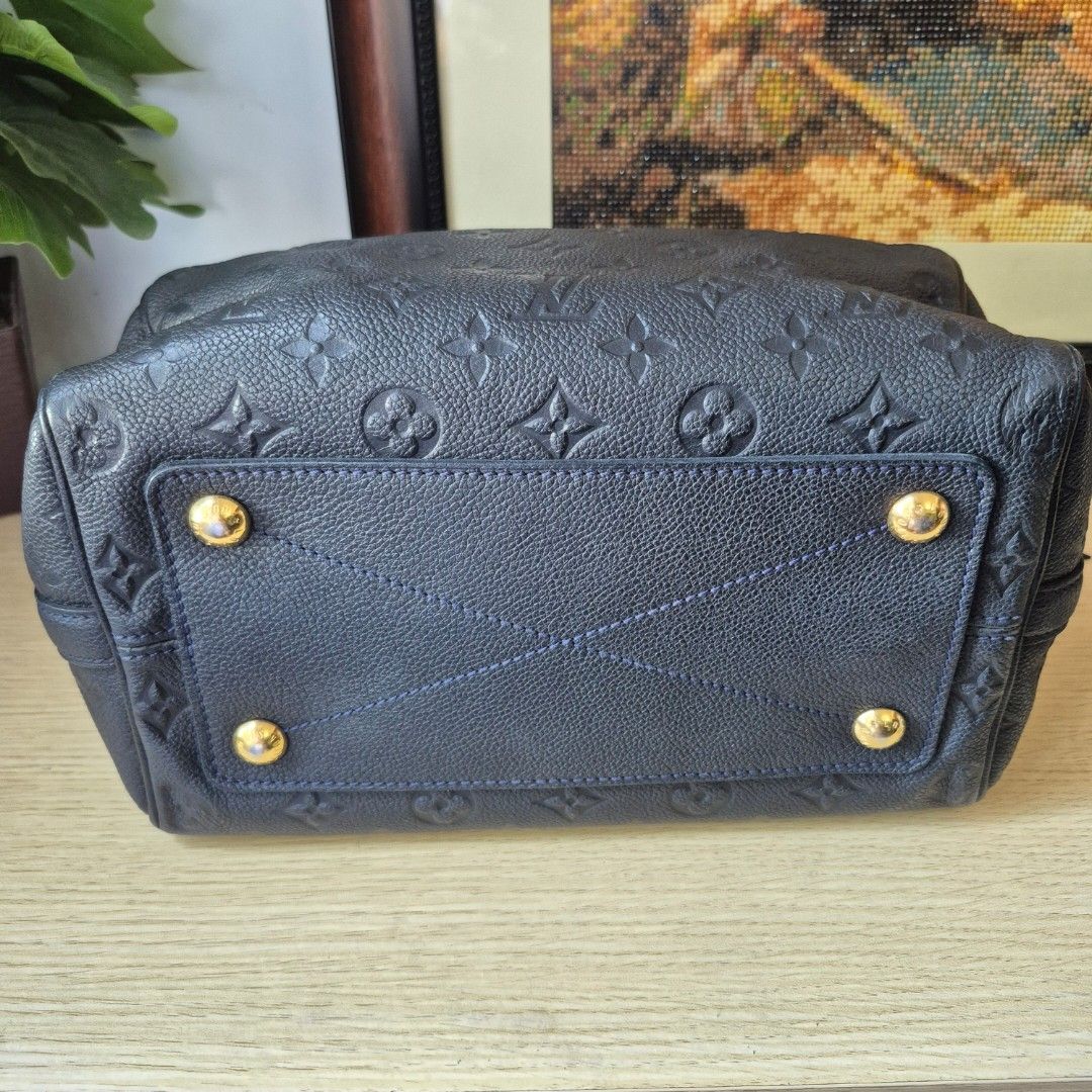 Louis Vuitton Empreinte Speedy Bag (Category: Luxury Bags & Wallets) located in Antipolo. Submitted by eastshoppinghaven (Listing ID 1446196887, Image 2). Description: - Authentic Louis Vuitton Speedy Bag - Material: Monogram Empreinte Leather - Includes: Detachable shoulder strap, extendable strap included but not able to show on the photos Soft style leather so in style today.