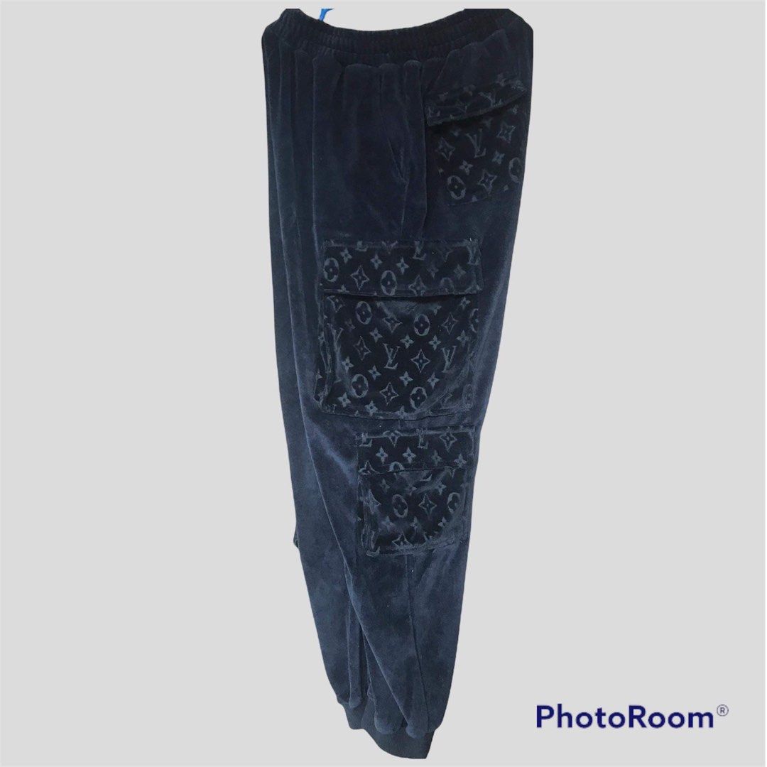 Louis Vuitton Velour Monogram Cargo Pants (Category: Luxury Apparel) located in Calapan. Submitted by lucasthrifts (Listing ID 1446294693, Image 1). Description: - Louis Vuitton monogram velour cargo pants Virgil Abloh design - Color: Black - Size: Fits L-XL - Made in Italy - Multiple pockets for storage - Convenient side zip pocket.