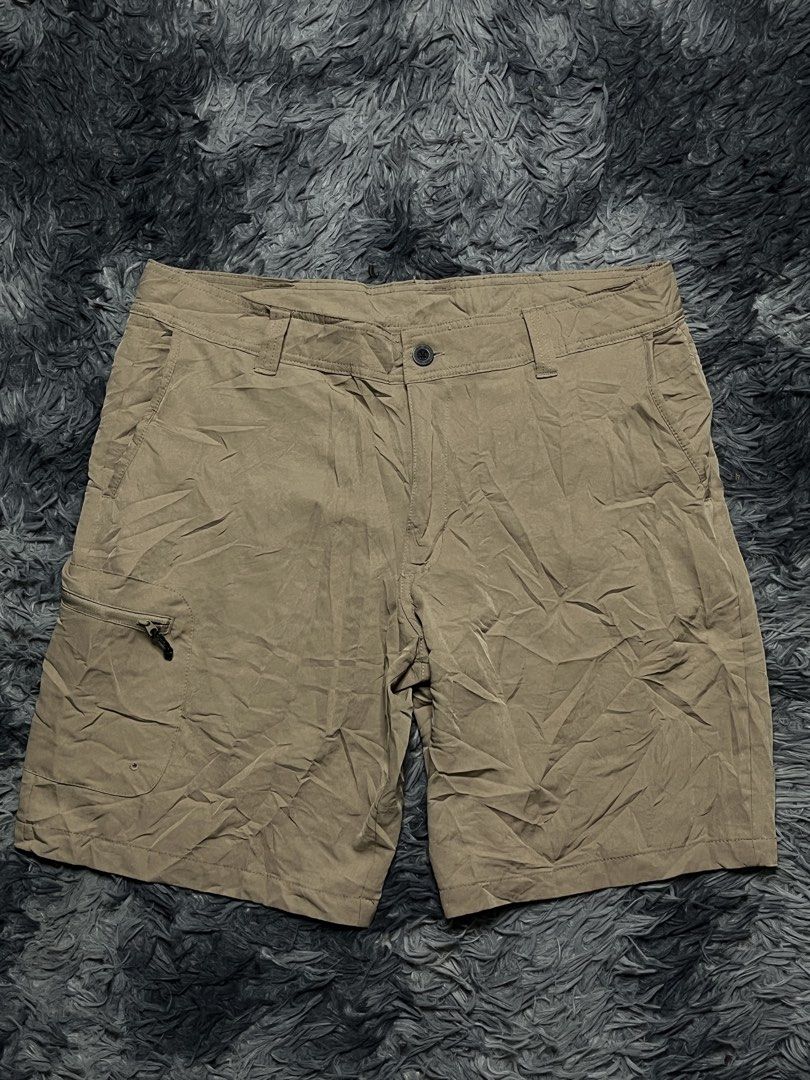 Magellan Outdoors Fish Gear Cargo Shorts Size 34 (Category: Shorts) located in Bulacan. Submitted by sef19 (Listing ID 1446342919, Image 1). Description: - Brand: Magellan Outdoors - Color: Khaki - Style: Cargo Shorts - Designed for: Fishing and outdoor activities - Features: Multiple pockets, including a zippered cargo pocket on the left leg - Closure: Button and zip fly - Fit: Comfortable for outdoor wear - Ideal for: Fishing trips, casual wear