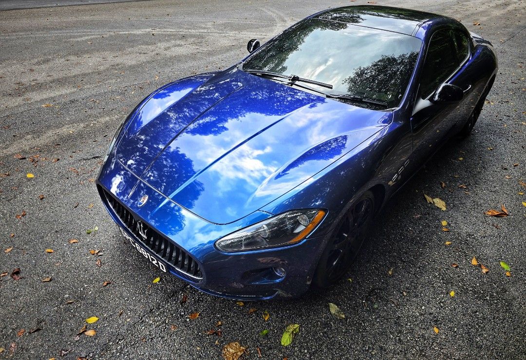 Maserati GranTurismo 4.2 (A) (Category: Used Cars) located in Singapore. Submitted by lsr792000 (Listing ID 1446187586, Image 1). Description: Beautiful blue Maserati GranTurismo 4.2 coupe. Year 2008 car. Stock car. No modification. No loan ie. fully paid up by me. Great for short drive to experience the power of V8 engine sound! Sleek design, very eye-catching. Italian flag badge on the side. Low mileage, well-maintained. Major repairs done up a