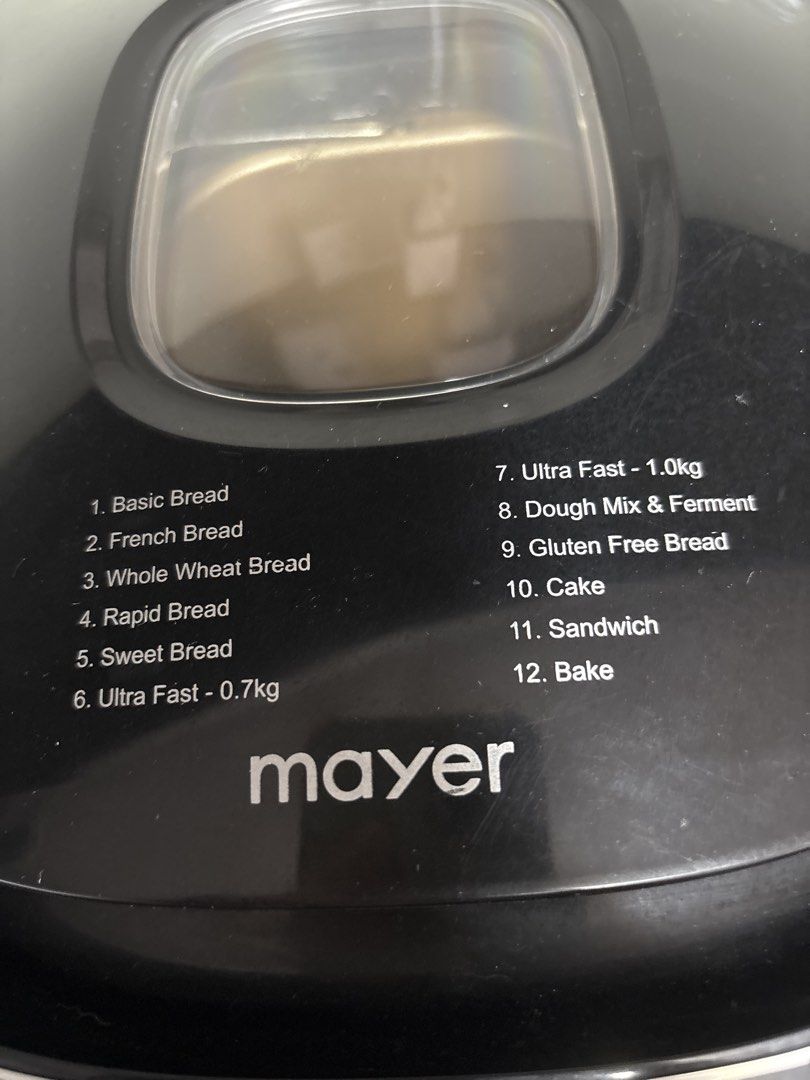Mayer Bread Maker - Multiple Bread Settings (Category: Breadmakers) located in Singapore. Submitted by thankyouforbuying (Listing ID 1446187971, Image 2). Description: - Mayer Bread Maker - 12 Pre-set Functions - Suitable for Basic, French, Whole Wheat, Sweet, Rapid, Ultra Fast breads - Also includes settings for Dough Mix & Ferment, Gluten Free Bread, Cake, Sandwich, and Bake - Comes with bread pan and kneading paddle - Ready for your baking adv