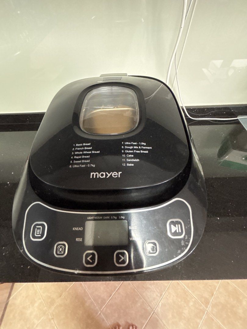 Mayer Bread Maker - Multiple Bread Settings (Category: Breadmakers) located in Singapore. Submitted by thankyouforbuying (Listing ID 1446187971, Image 1). Description: - Mayer Bread Maker - 12 Pre-set Functions - Suitable for Basic, French, Whole Wheat, Sweet, Rapid, Ultra Fast breads - Also includes settings for Dough Mix & Ferment, Gluten Free Bread, Cake, Sandwich, and Bake - Comes with bread pan and kneading paddle - Ready for your baking adv