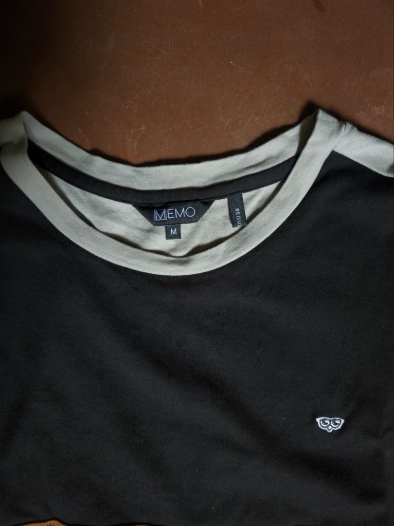MEMO Color Block T-shirt Size M (Category: Tshirts & Polo Shirts ) located in Manila. Submitted by john16bit (Listing ID 1446211883, Image 2). Description: - Size: Medium (M), W19.5 x L26 - Color Block Design: Black, Tan, Grey - Small MEMO logo on chest - Material: 100% Cotton - Perfect for casual wear RFS: Declutter, I don't wear it anymore.
