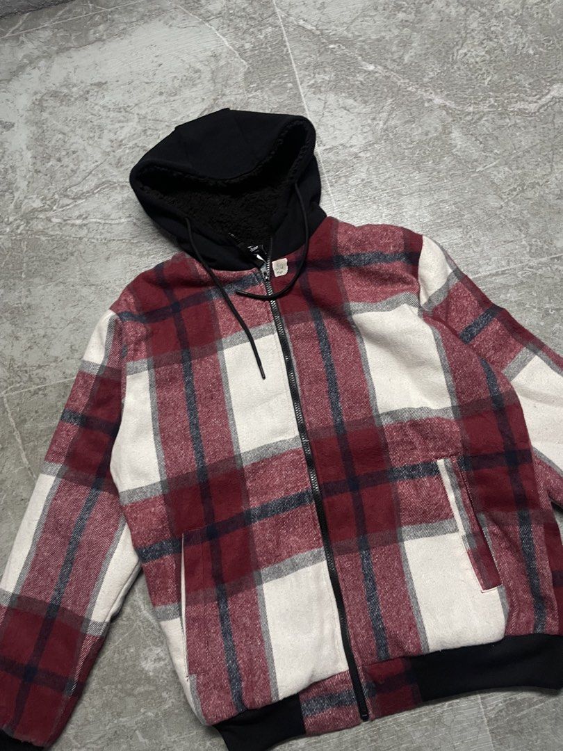 Men's Plaid Bomber Jacket with Black Hood (Category: Coats, Jackets and Outerwear) located in Manila. Submitted by rayne2thrift (Listing ID 1446317567, Image 2). Description: - Stylish plaid bomber jacket - Color: Burgundy, white, and dark blue plaid - Black hood with cozy sherpa lining - Full zipper closure - Ribbed cuffs and hem for a snug fit - Ideal for everyday casual wear.