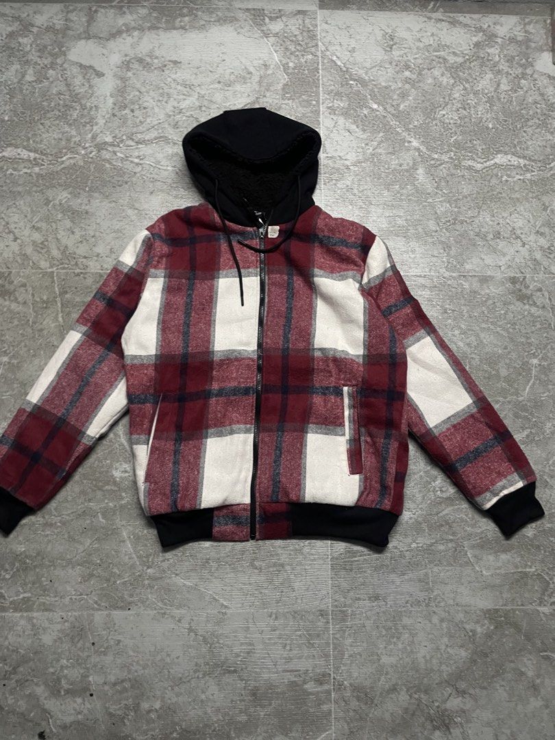 Men's Plaid Bomber Jacket with Black Hood (Category: Coats, Jackets and Outerwear) located in Manila. Submitted by rayne2thrift (Listing ID 1446317567, Image 1). Description: - Stylish plaid bomber jacket - Color: Burgundy, white, and dark blue plaid - Black hood with cozy sherpa lining - Full zipper closure - Ribbed cuffs and hem for a snug fit - Ideal for everyday casual wear.