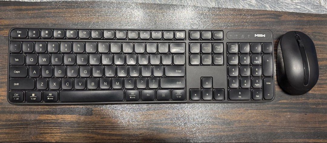 MIIIW Wireless Keyboard and Mouse Combo (Category: Computer Keyboard) located in Caloocan City. Submitted by rayleighscloset (Listing ID 1446344774, Image 1). Description: - MIIIW Wireless Keyboard and Mouse Set - Color: Black - Keyboard: Full-sized with dedicated numeric keypad - Mouse: Wireless, ergonomic design - Power: AA batteries - Ideal for home or office desk setups - Plug-and-play convenience via USB.