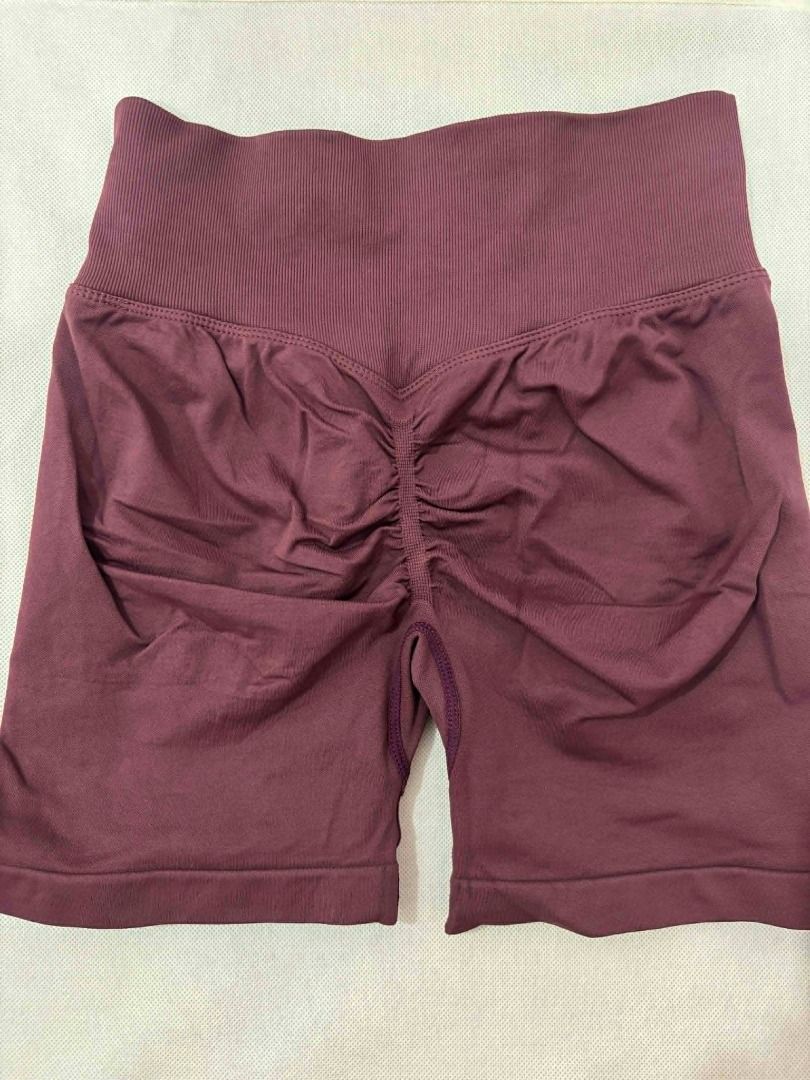 Moving Peach Seamless Ruched Butt Lifting Workout Shorts (Category: Activewear) located in Naga. Submitted by eve.prelovedclothing (Listing ID 1446292241, Image 3). Description: - High-waisted seamless shorts - Features ruched detailing - Ideal for workouts and lounging - Made with stretchy and comfortable fabric - Available colors: maroon, dusty rose, black - Ideal for size XS-Medium - Medium size on tag - Php 400 each.