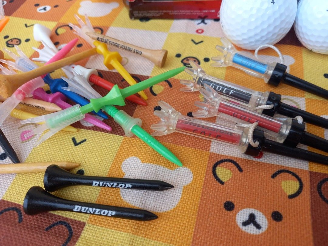 Nike Golf Balls & Assorted Golf Tees (Category: Golf) located in Bulacan. Submitted by arax_kumashop (Listing ID 1446262630, Image 3). Description: - Set of 2 pieces Nike Ti-Velocity golf balls - Assorted golf tees included: wooden, plastic, and adjustable height - Brands featured: Dunlop, Bridgestone - Ideal for practice sessions or casual rounds of golf.