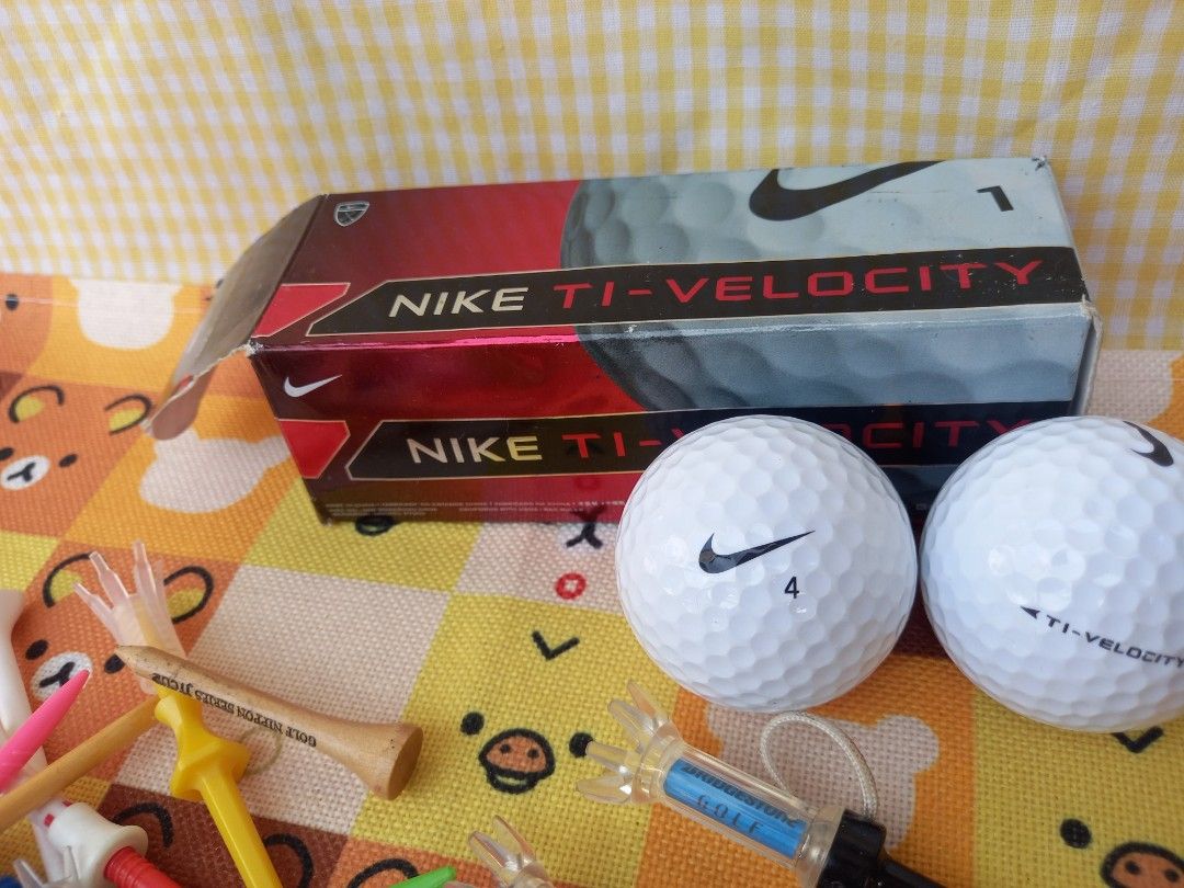 Nike Golf Balls & Assorted Golf Tees (Category: Golf) located in Bulacan. Submitted by arax_kumashop (Listing ID 1446262630, Image 2). Description: - Set of 2 pieces Nike Ti-Velocity golf balls - Assorted golf tees included: wooden, plastic, and adjustable height - Brands featured: Dunlop, Bridgestone - Ideal for practice sessions or casual rounds of golf.