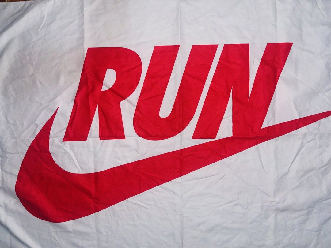 Nike RUN White Red Swoosh Towel (Category: Bedding & Towels) located in Manila. Submitted by rare_goldy (Listing ID 1446291628, Image 3). Description: - Large Nike Microfiber towel - Iconic swoosh and 'RUN' text - Ideal for gym, beach, or drying off - Color: White with bold red graphics - Approximate dimensions: 55 inches x 27 inches.