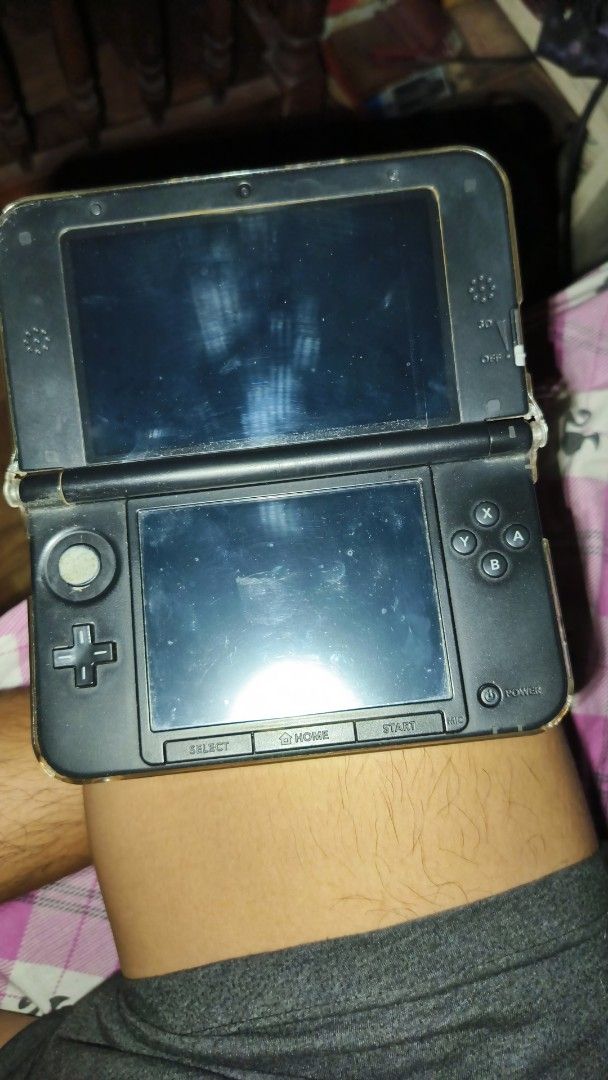 Nintendo 3DS XL with Games and Case (Category: Nintendo) located in Muntinlupa City. Submitted by jballsofsteel (Listing ID 1446260671, Image 2). Description: - Nintendo 3DS XL console - Includes game case with 6 games: - Lego Star Wars - Pokemon Sun - Monster Hunter Generations - Fire Emblem Fates - Console shows some signs of wear but is fully functional. - Excellent bundle for any gamer with 400+ games in 1 lots of pokemon games looking for a 