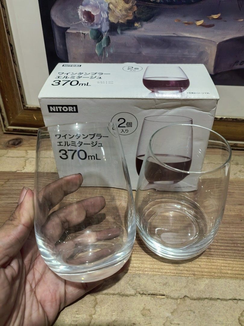 Nitori Branded Stemless Wine Tumbler Set (Category: Other Kitchenware & Tableware) located in Cebu City. Submitted by dudes_villanueva (Listing ID 1446313368, Image 2). Description: Nitori Branded Stemless Wine Tumbler Set Brand New with Box 📌 Featuring a 370ml capacity. 📌 The box contains 2 pieces of glass tumblers. 📌 It is suitable for both red and white wine..