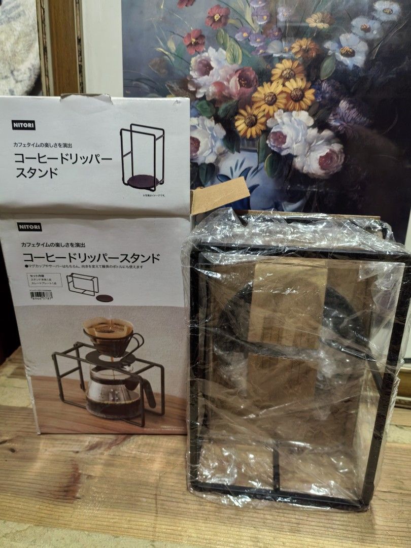 Nitori Coffee Dripper Stand (Category: Coffee & Tea Tableware) located in Cebu City. Submitted by dudes_villanueva (Listing ID 1446316111, Image 2). Description: Nitori Coffee Dripper Stand Brand New with box ☕ Constructed from matte black steel. ☕ The stand measures approximately 32 cm in width, 20 cm in depth, and 20 cm in height. ☕ It is designed to hold a coffee dripper and server, with the flexibility to fit bottles by changing its orientati