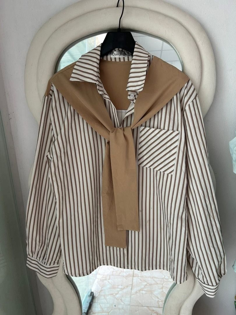 Old Money 2 in 1 Polo (Category: Longsleeves) located in Caloocan City. Submitted by tomclawset (Listing ID 1446275835, Image 2). Description: Perfect pair with skirt or trouser!! Good condition! Cotton knit ang fabric nung dark brown the stripes is soft cotton-linen.